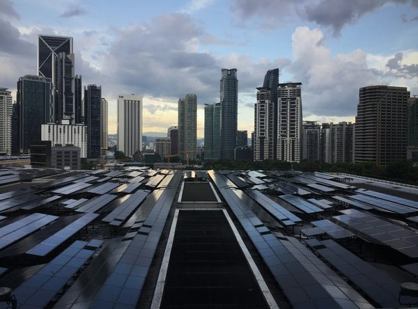 What are the critical factors in choosing a catalytic converter for a UK car meeting latest emissions standards?